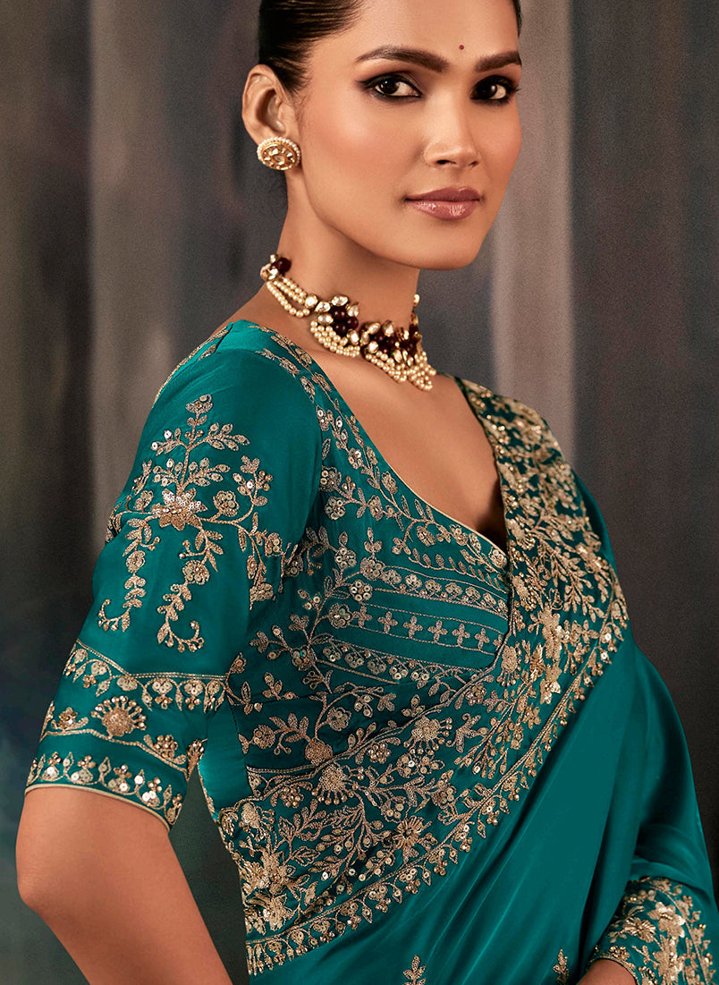 Monjolika Fashion Teal Faux Satin Embroidery Bridal Reception Festival Wedding Wear Heavy Border Saree