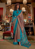 Monjolika Fashion Aqua Blue and Rust Silk Blend Ikat Print Work Contemporary Saree