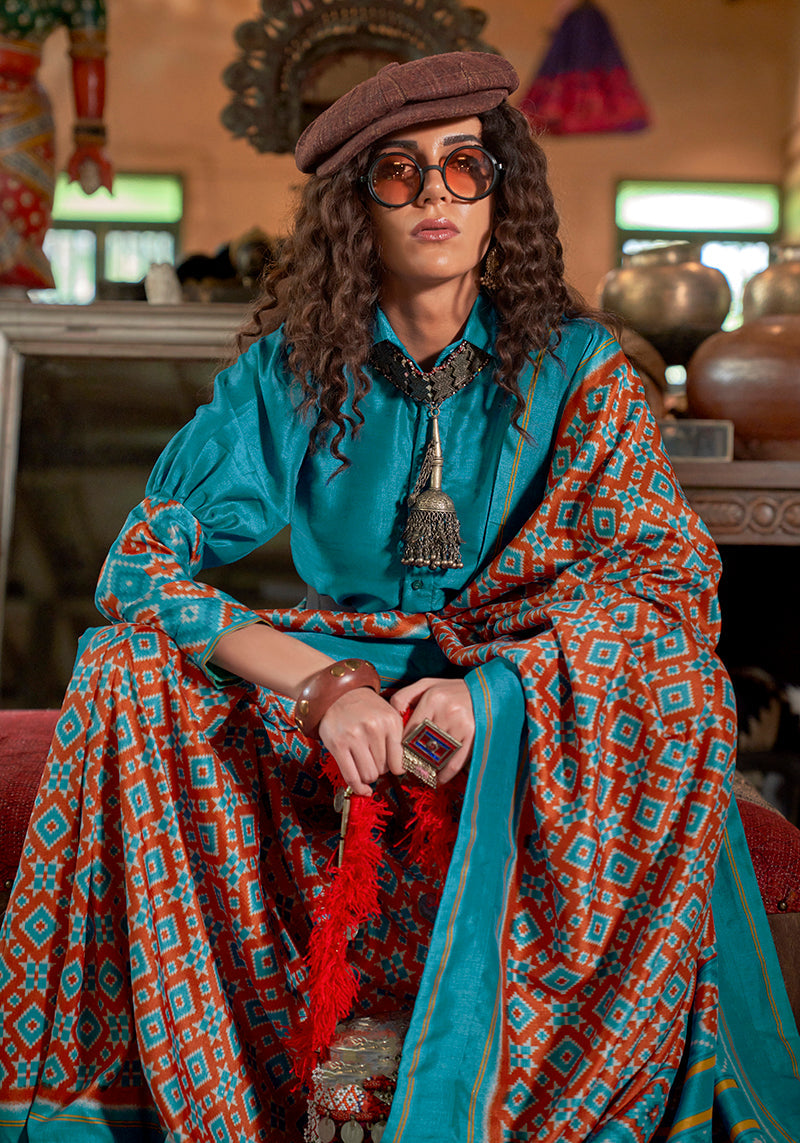 Monjolika Fashion Aqua Blue and Rust Silk Blend Ikat Print Work Contemporary Saree