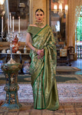 Monjolika Fashion Kanjivaram Silk Blend Classic Saree with Woven Work for Women in Green