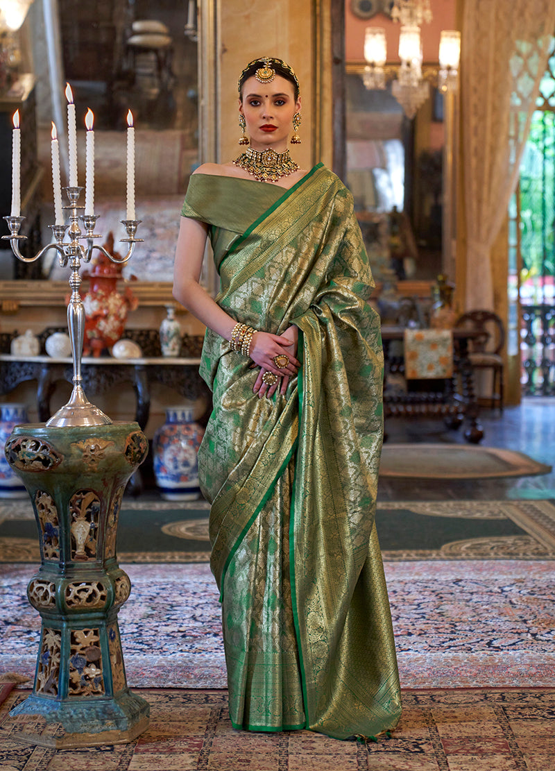 Monjolika Fashion Kanjivaram Silk Blend Classic Saree with Woven Work for Women in Green