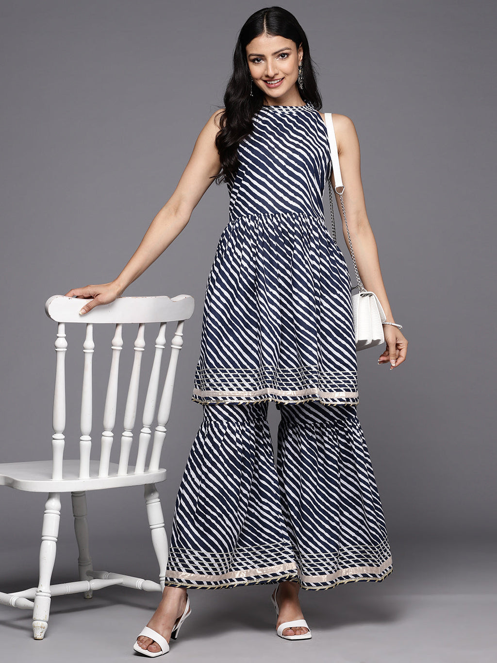 KSUT (House of Varanga) Blue And White Leheriya Halter Neckline Gota Work Kurta With Sharara