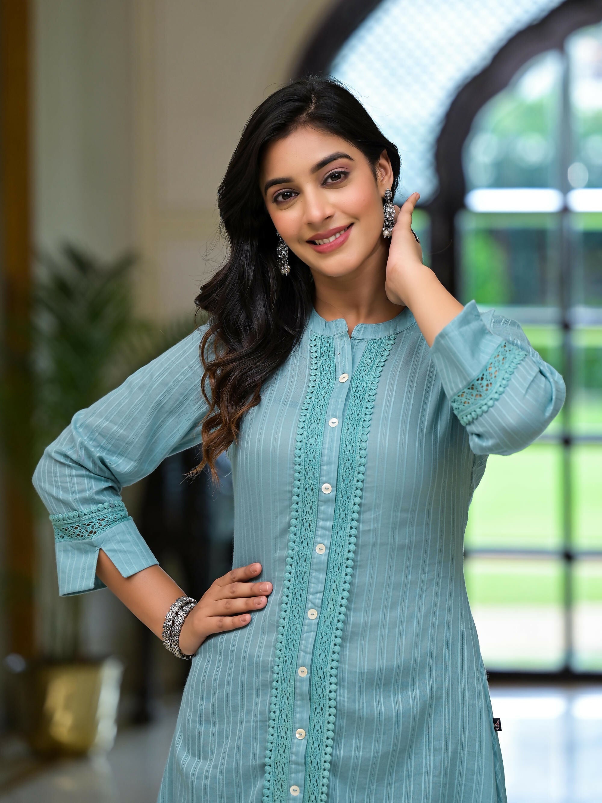 Juniper Women's Sky Blue Thread Embroidered Cotton Asymmetrical Kurta With Button Closure