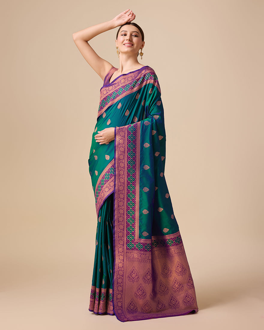 Monjolika Fashion Dark Teal Color Banarasi Rich Zari Woven Weave For Opulent Charm Silk Saree
