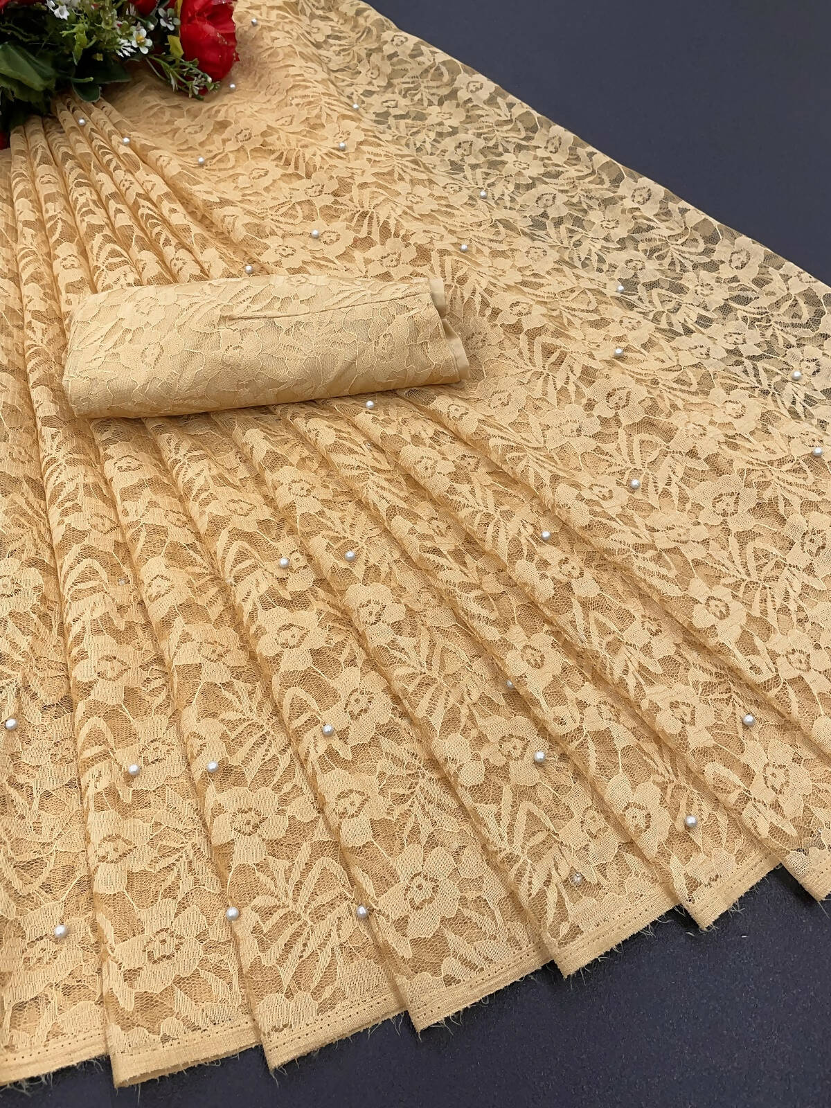 Vamika Brown Pearls Net Saree