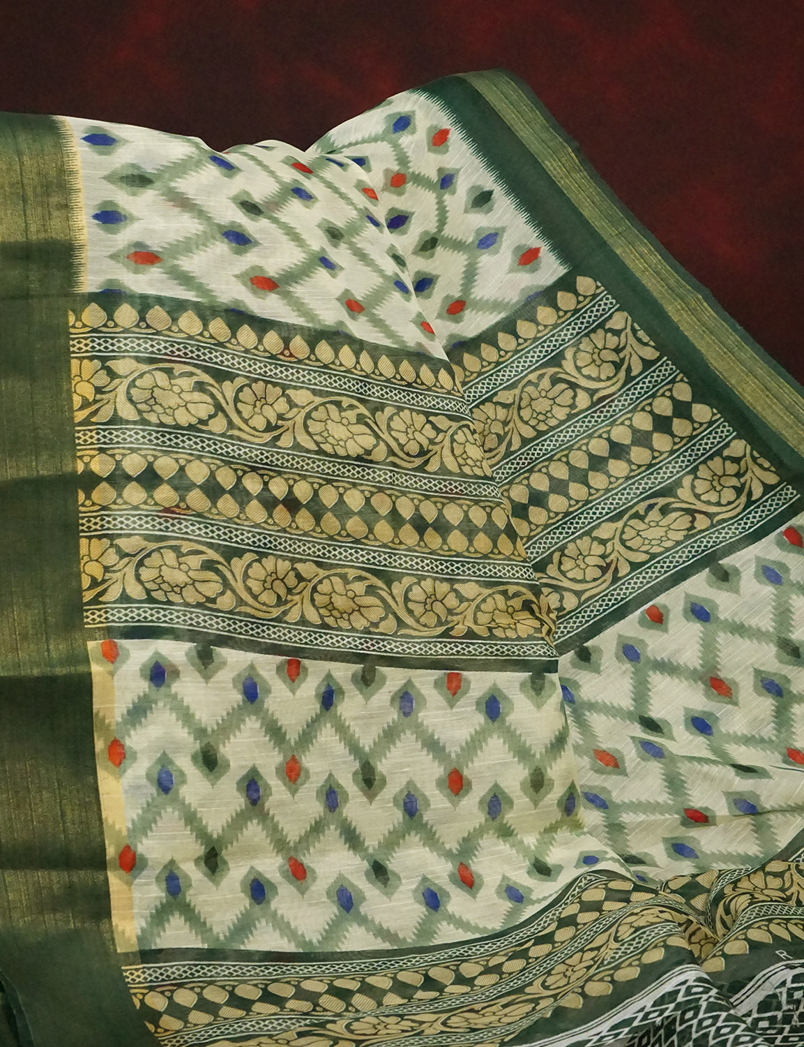 Half White And Parrot Green Colour Ikat Design Semi Chanderi Saree By Gayathri Reddy Designer Studio