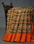 Shades of Dark Green And Orange Colour Patola Print Semi Chanderi Saree By Gayathri Reddy Designer Studio