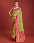 Monjolika Fashion Glamour And Tradition With This Parrot Green Color Zari Woven Banarasi Tissue Silk Saree
