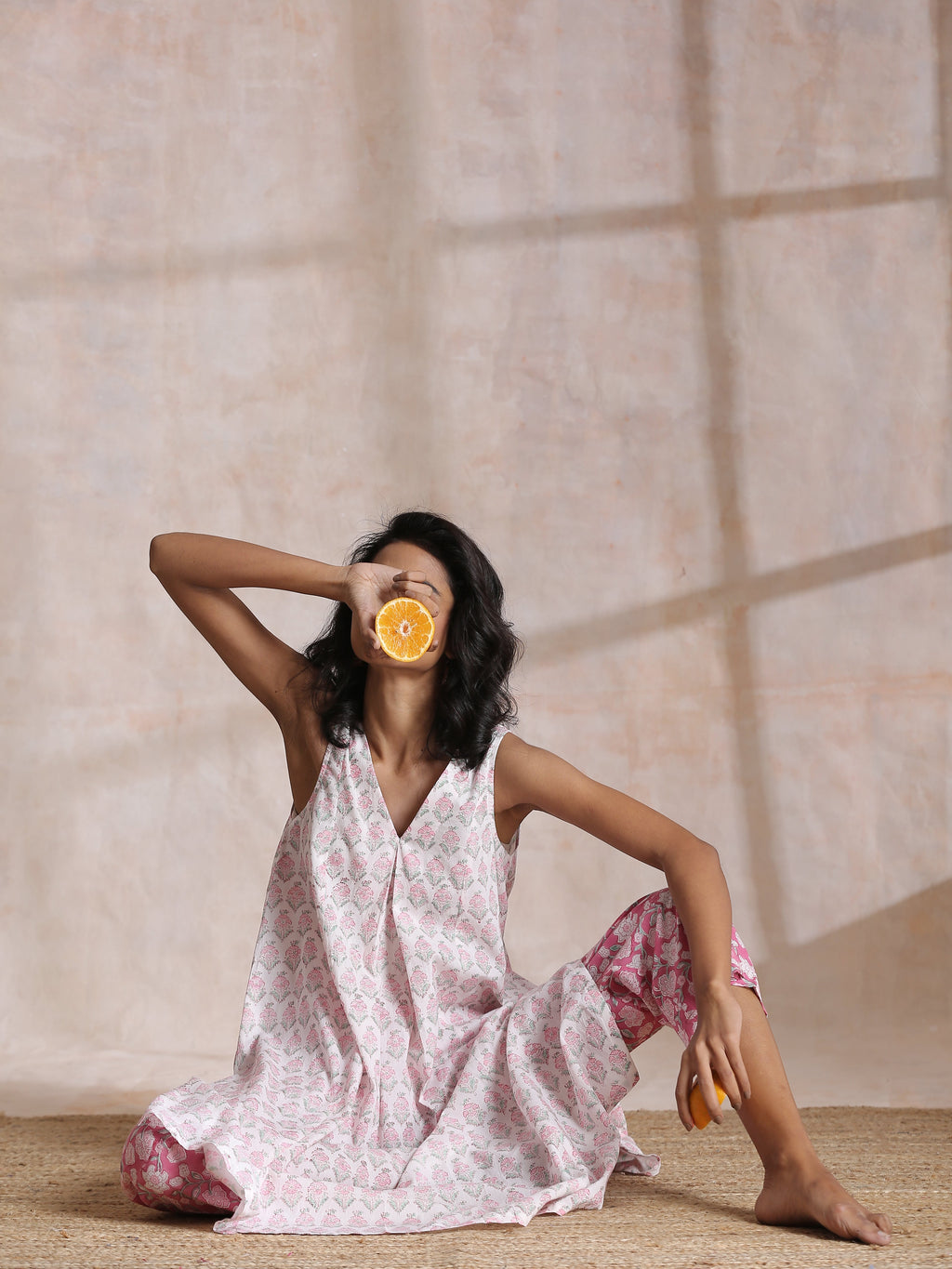 trueBrowns Pink Green Floral On White Block Print Cotton Sleeveless Flared Kurta Pant Set