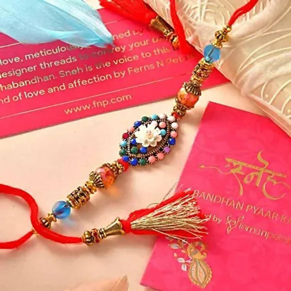Floral Blue Rakhi N Coffee Biscotti Hamper