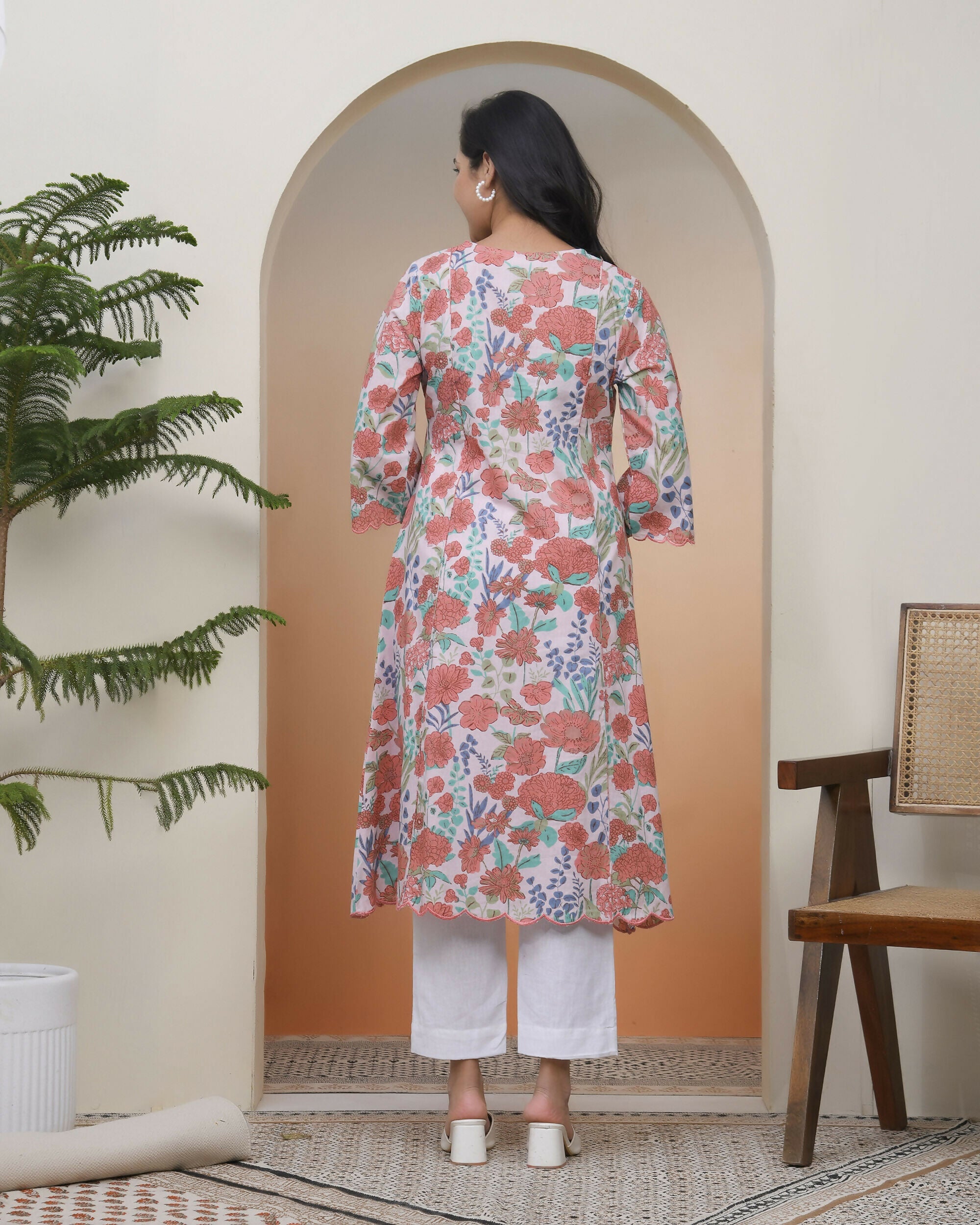 Vaasva Women Peach Floral Cotton Printed Flare Kurti With Pant