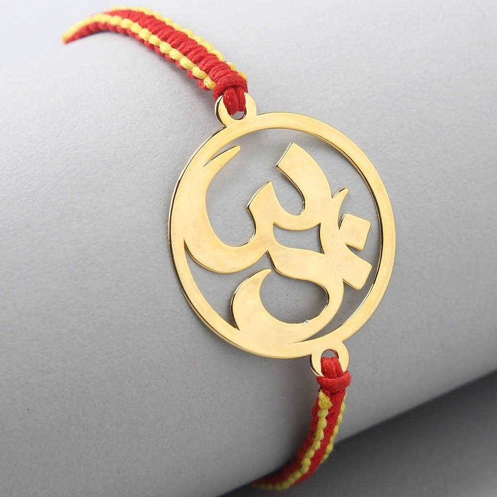 Ethnic Om Metal Rakhi & Dairy Milk Chocolates