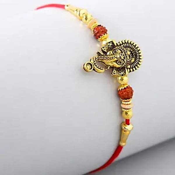 Lord Ganesha Rudraksha Rakhi & Kaju Roll Box