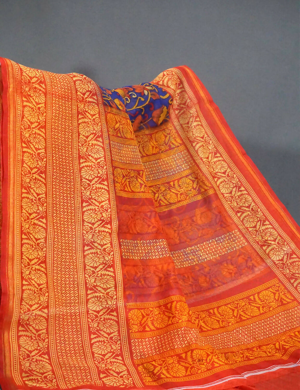Vibrant Combination Of Ink Blue Kalamkaari Design Semi Chanderi Saree With Contrast Blouse By Gayathri Reddy Designer Studio