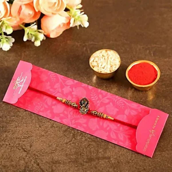 Serene Lord Krishna Rakhi & Cashew Jar