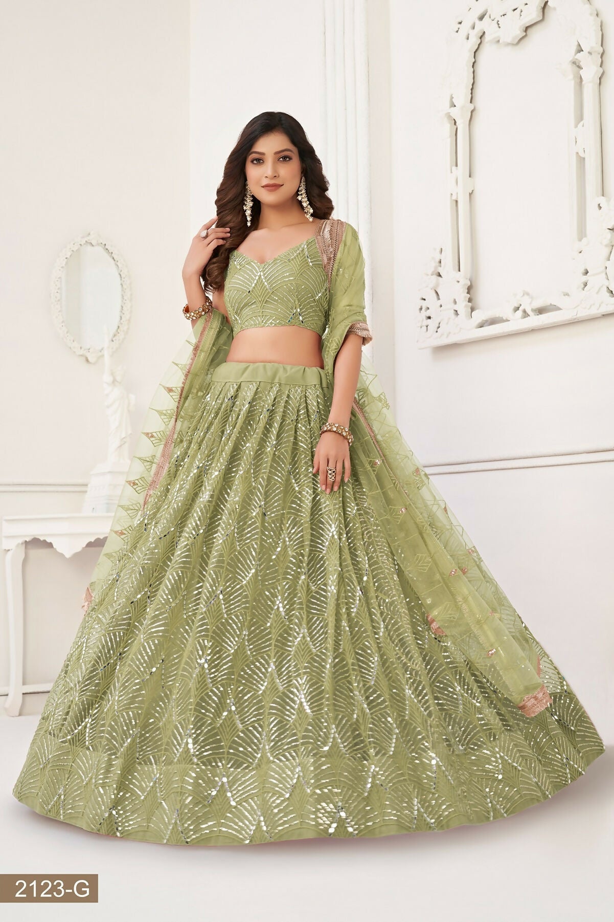 Eilara Glamorous Pista Green Net With Sequins And Thread Embroidery Real Mirror Work Lehenga Choli For Wedding