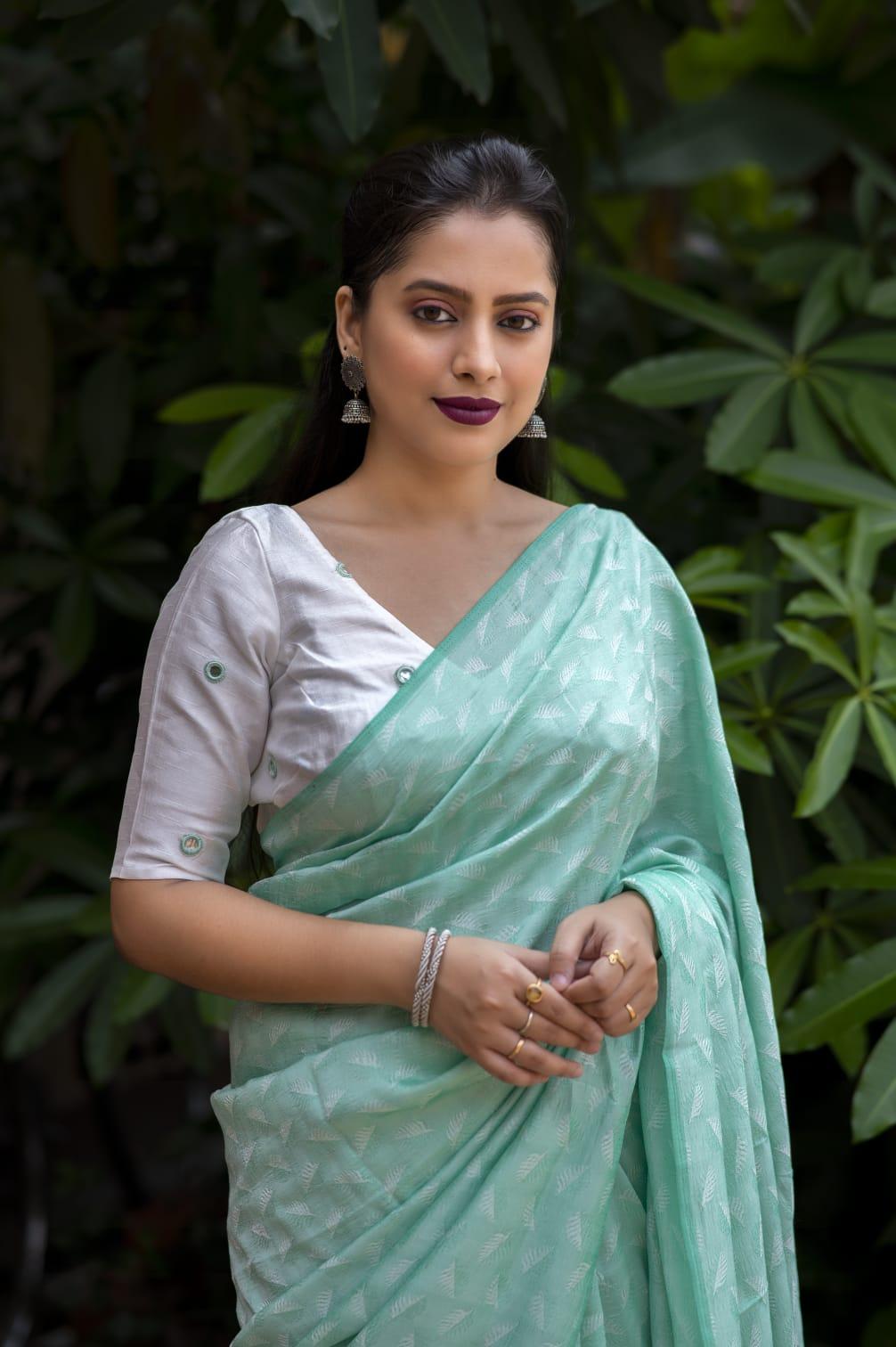 Green Poly Georgette Woven Design Saree with Unstitched Blouse - Hiral Fashion