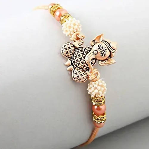 Holy Ganesha Rakhi & Ferrero Rocher Moments Pack