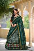 Lorenvalley Green Tussar Silk Ikkat Print With Foil Work Lehenga Choli with Dupatta