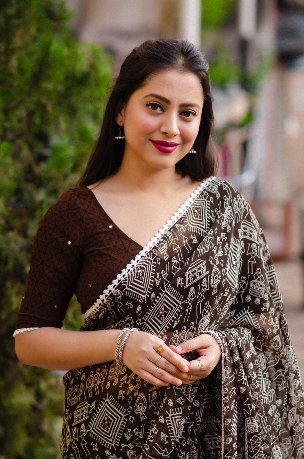 Coffee Poly Georgette Ethnic Motifs Saree with Unstitched Blouse - Hiral Fashion