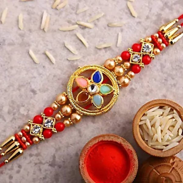 Flower Design Kundan Rakhi And Almonds Jar