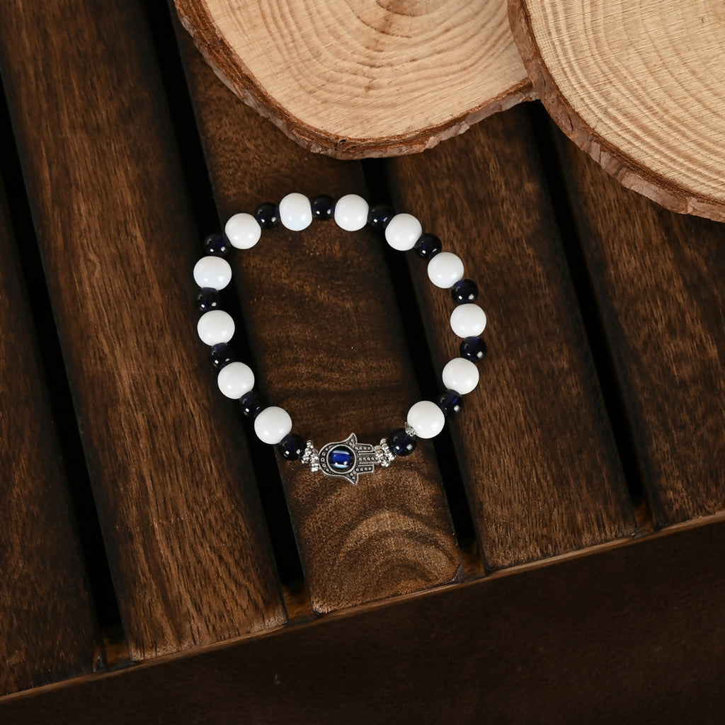 NVR Women & Men Black & White Evil Eye Elasticated Rakhi With Roli Chawal