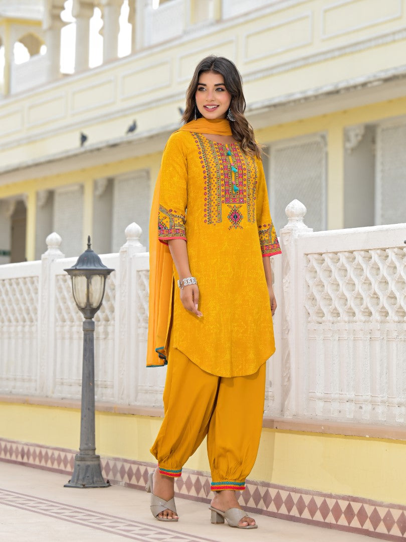 Juniper Women's Mustard Ethnic Motif Printed Kurta, Pant And Dupatta Set With Tassels & Buttons.