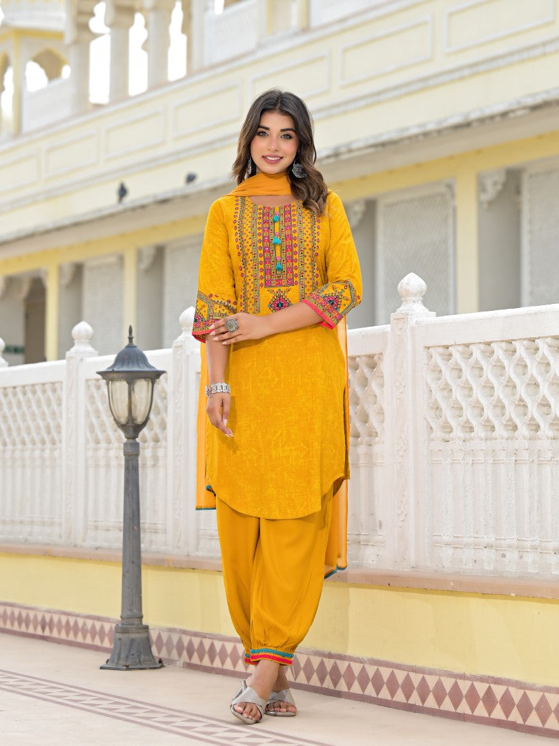 Juniper Women's Mustard Ethnic Motif Printed Kurta, Pant And Dupatta Set With Tassels & Buttons.