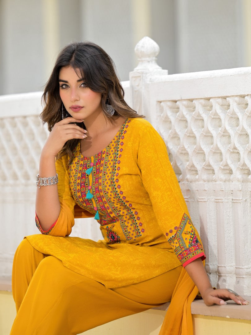 Juniper Women's Mustard Ethnic Motif Printed Kurta, Pant And Dupatta Set With Tassels & Buttons.