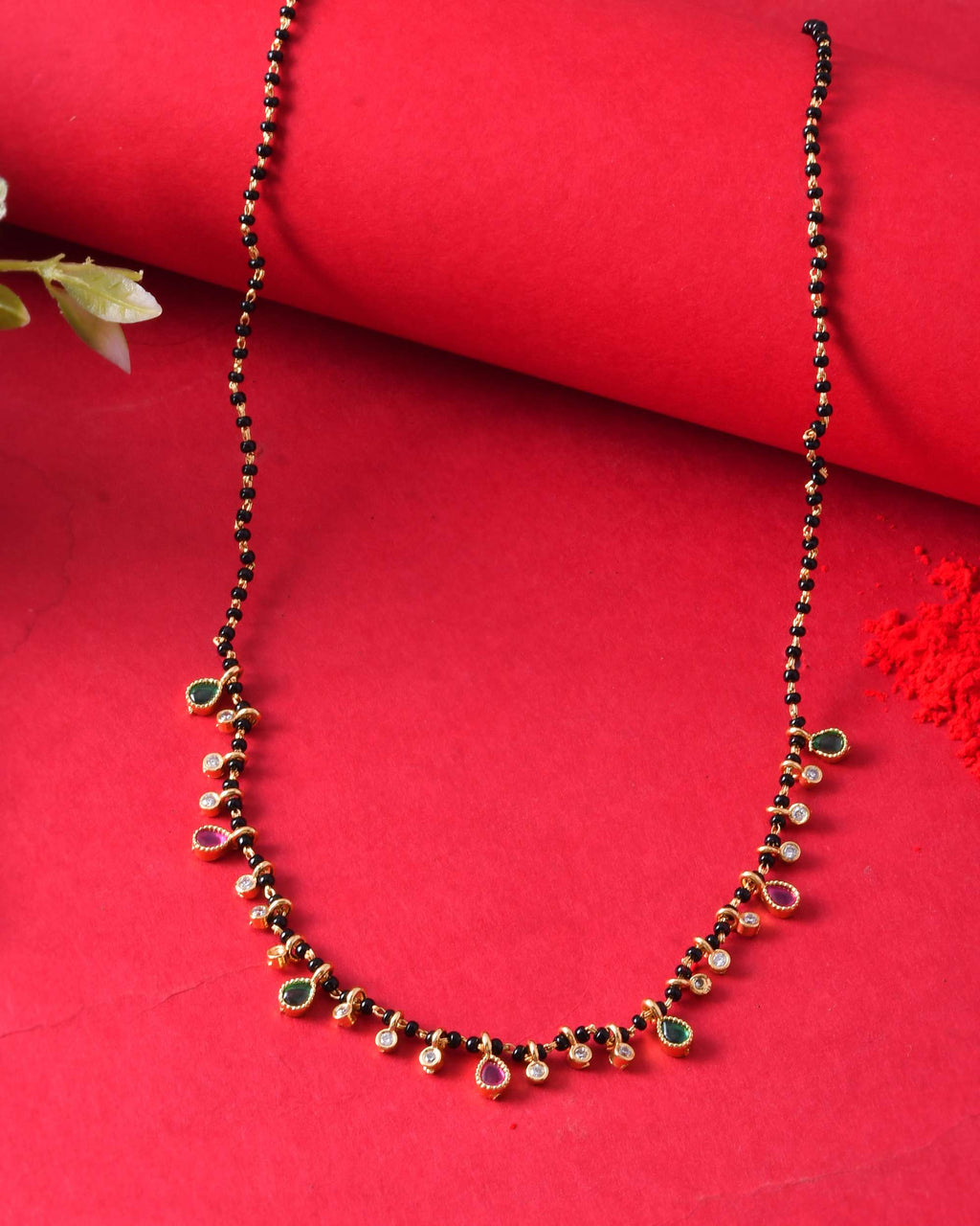 Jewels Nest Elegant Black Beads Mangalsutra with Green & Red Stone Drops – Silver Finish