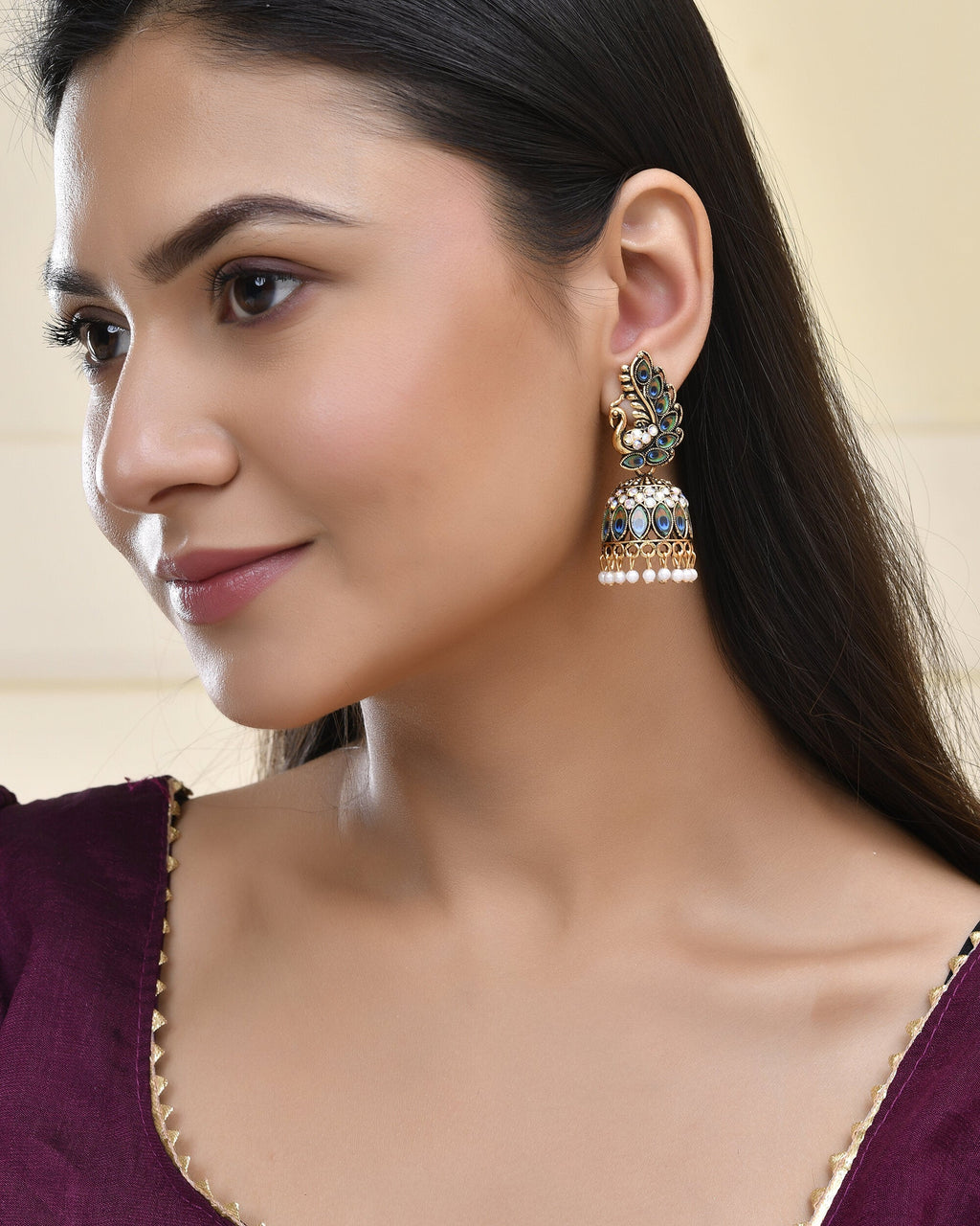 Jewels Nest Peacock-Inspired Gold-Polished Jhumka Earrings with Multicolor Stones