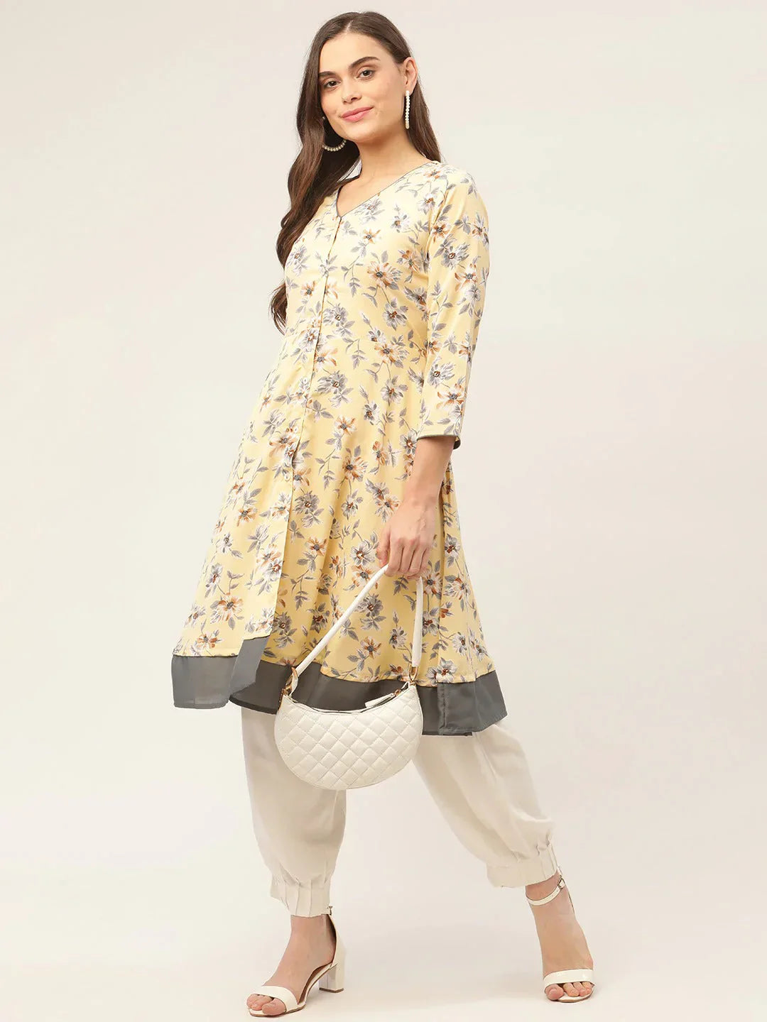 Jompers Women's Yellow and White Flared Printed kurta
