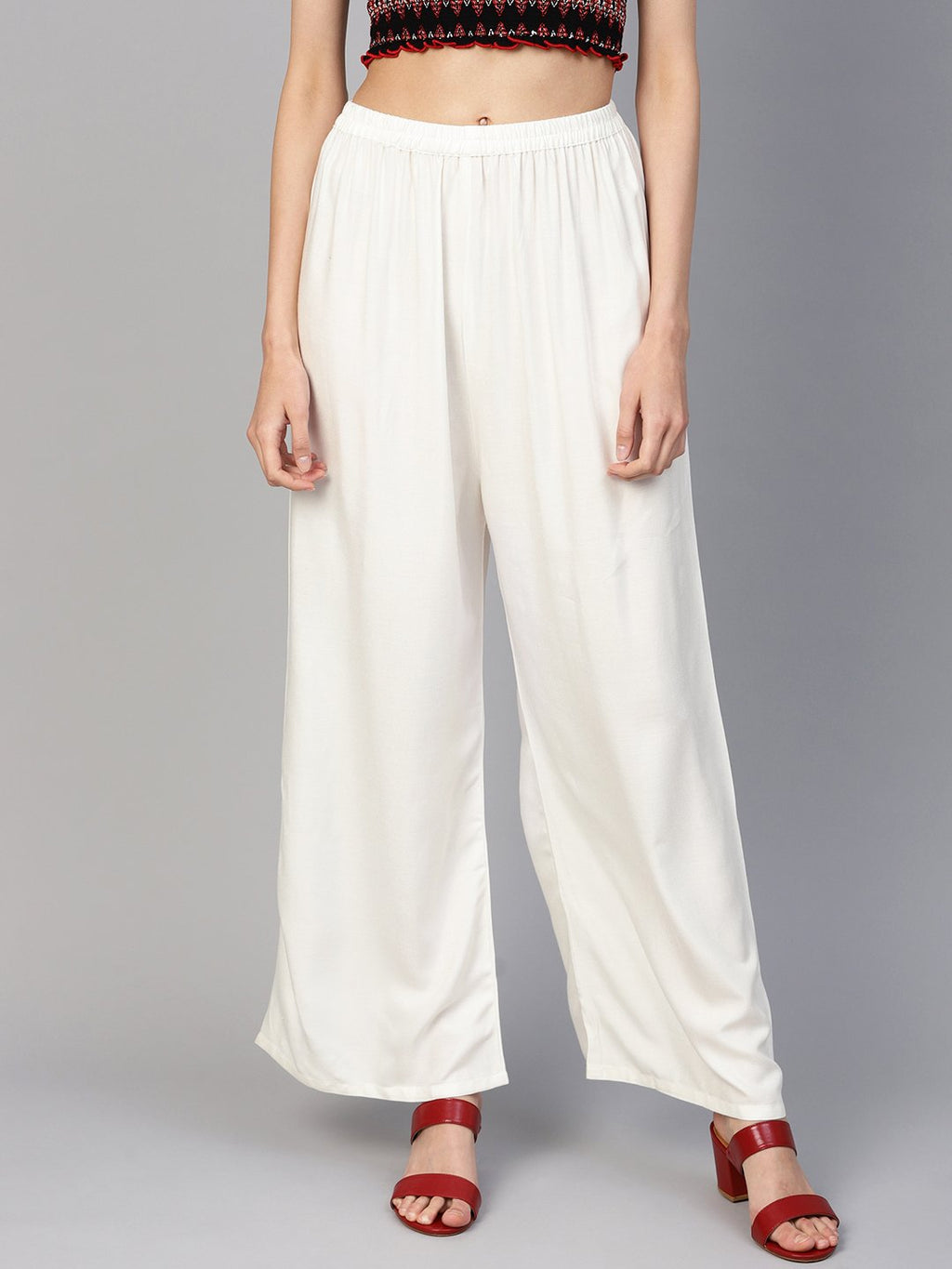 Jompers Women Off-White Solid Straight Palazzos
