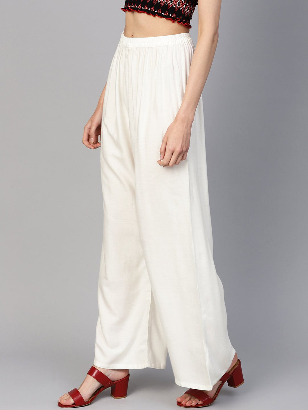 Jompers Women Off-White Solid Straight Palazzos