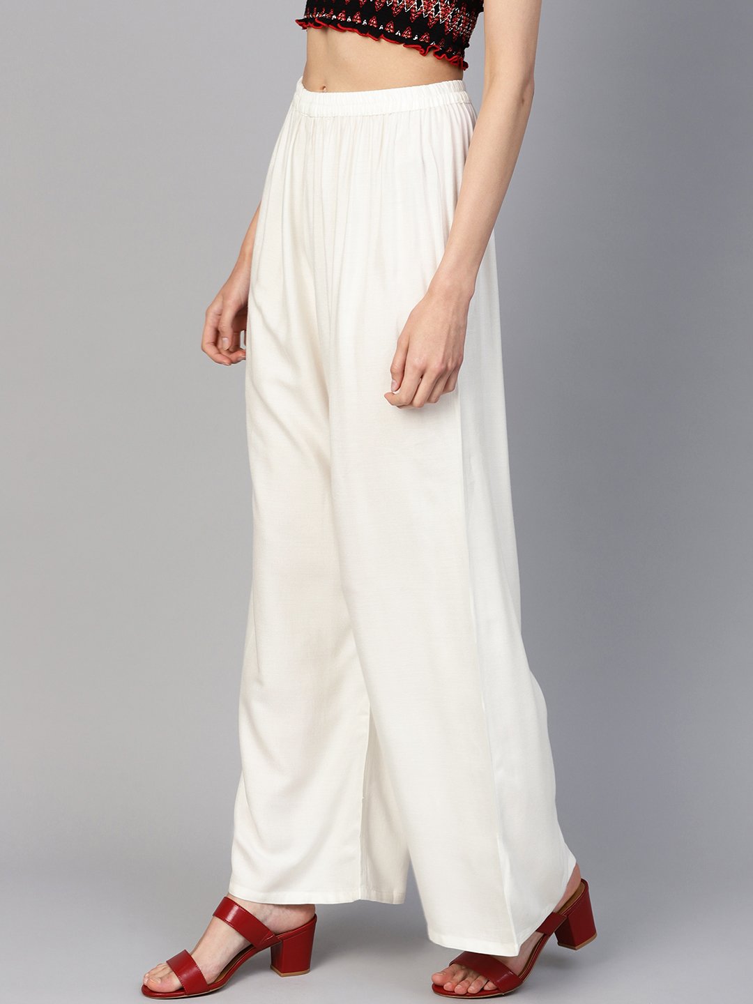 Jompers Women Off-White Solid Straight Palazzos