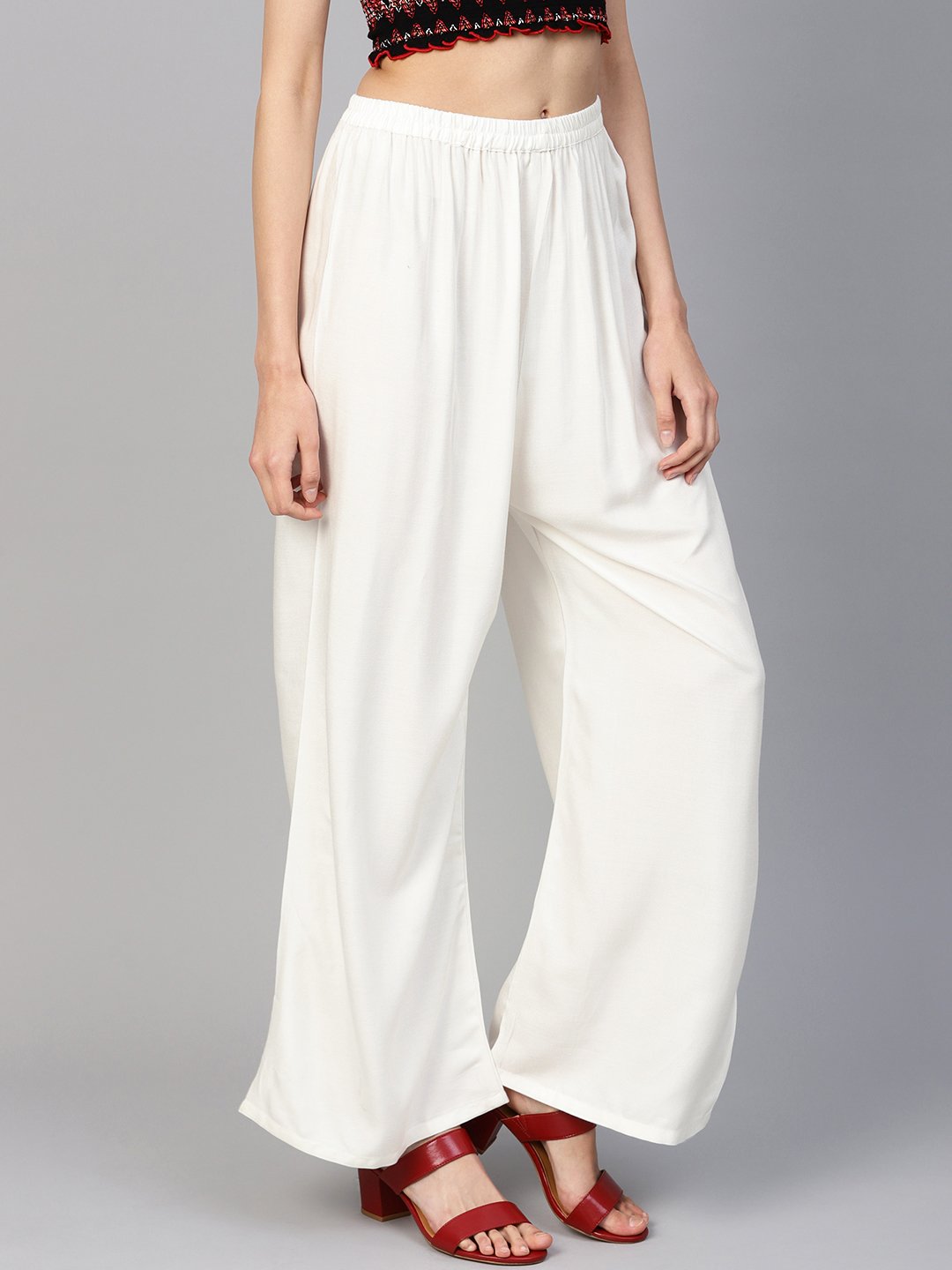 Jompers Women Off-White Solid Straight Palazzos