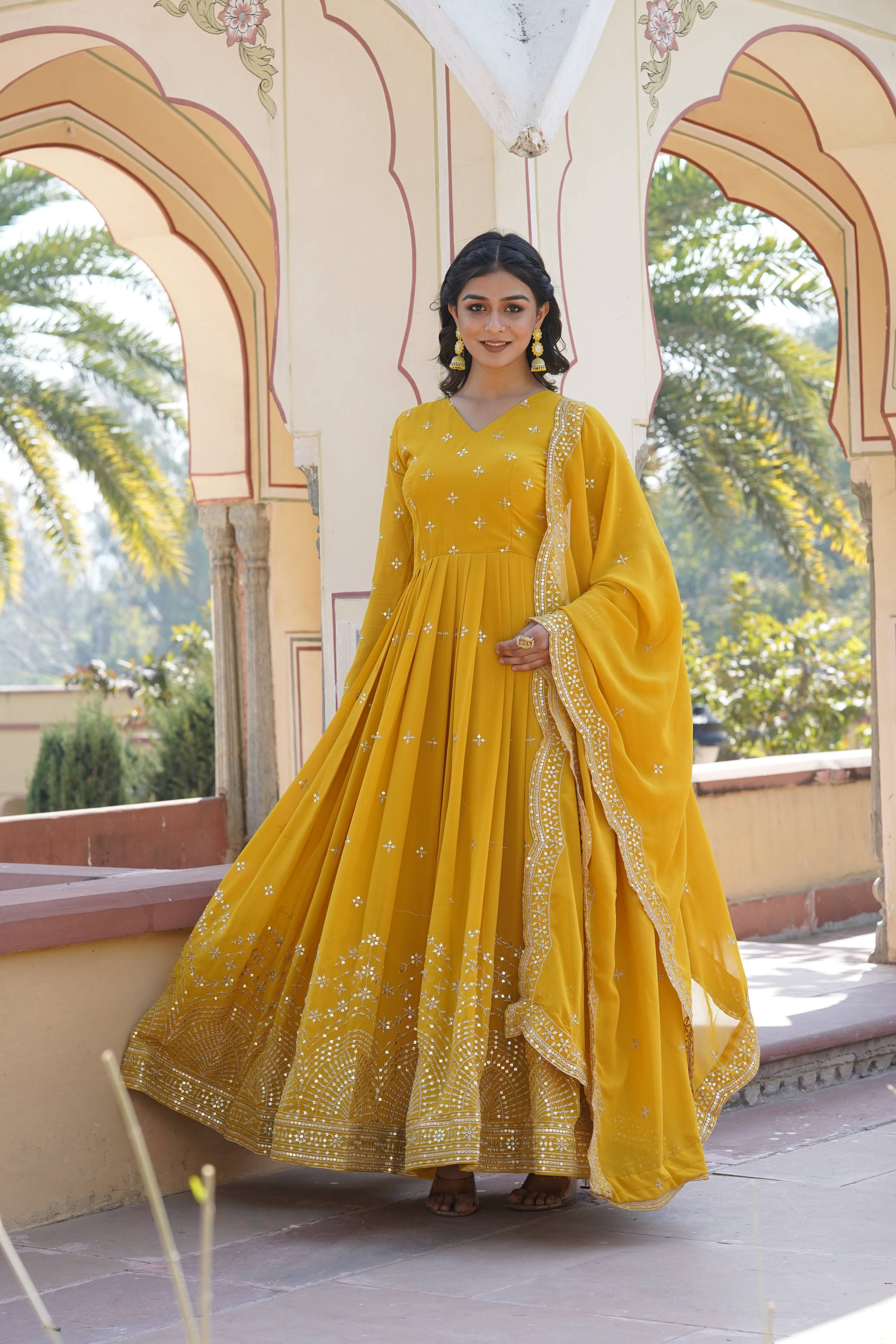 Teeya Creation Yellow Color Faux Georgette Party Wear Heavy Embroidery Work Fully Stitched Gown