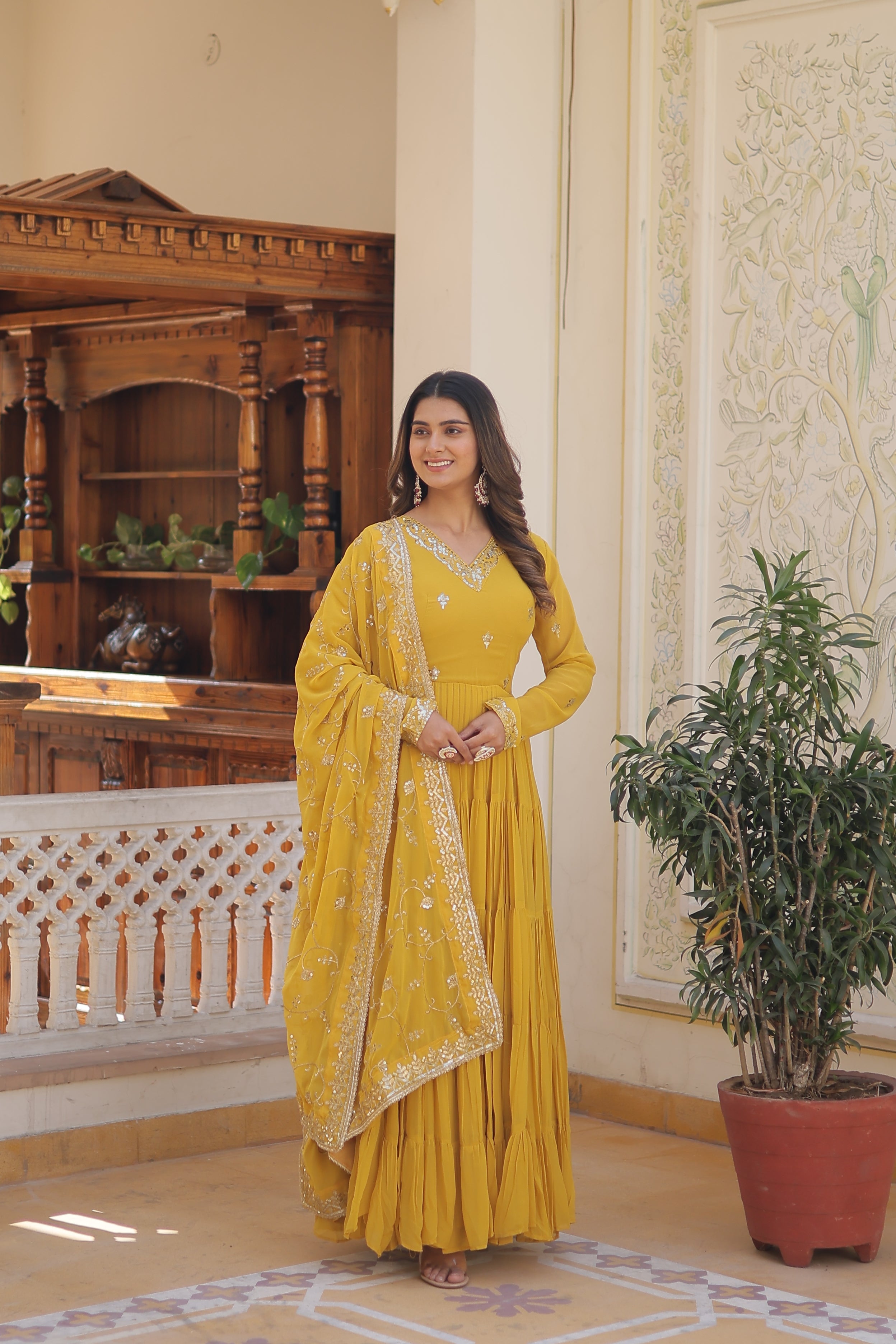Teeya Creation Yellow Color Faux Georgette Heavy Work Fully Stitched Gown