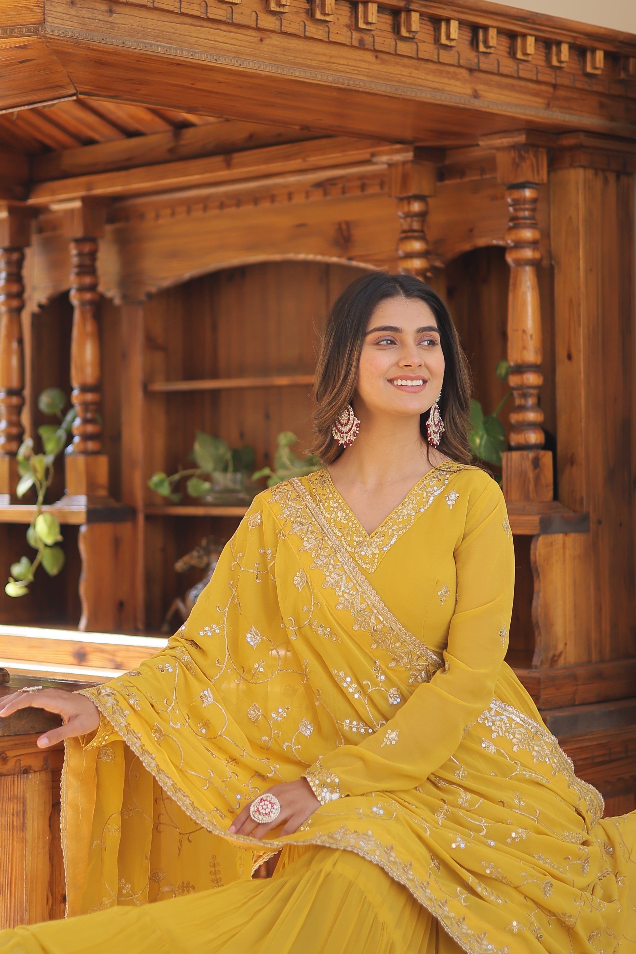 Teeya Creation Yellow Color Faux Georgette Heavy Work Fully Stitched Gown