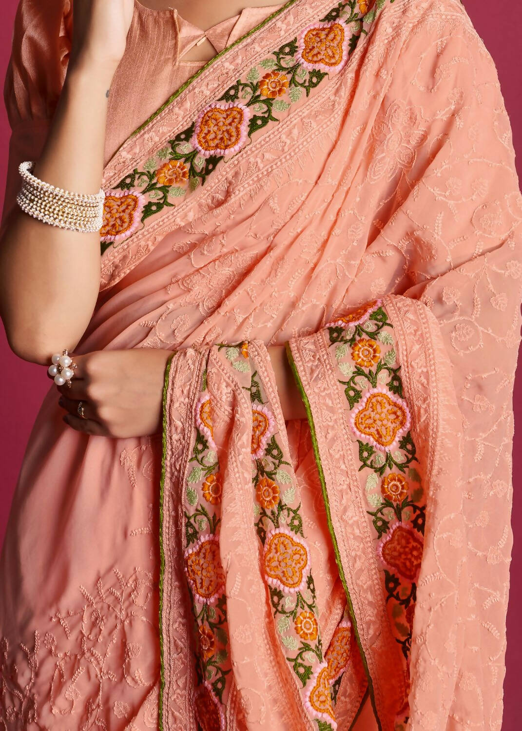 Vamsee Peach Georgette Designer Saree