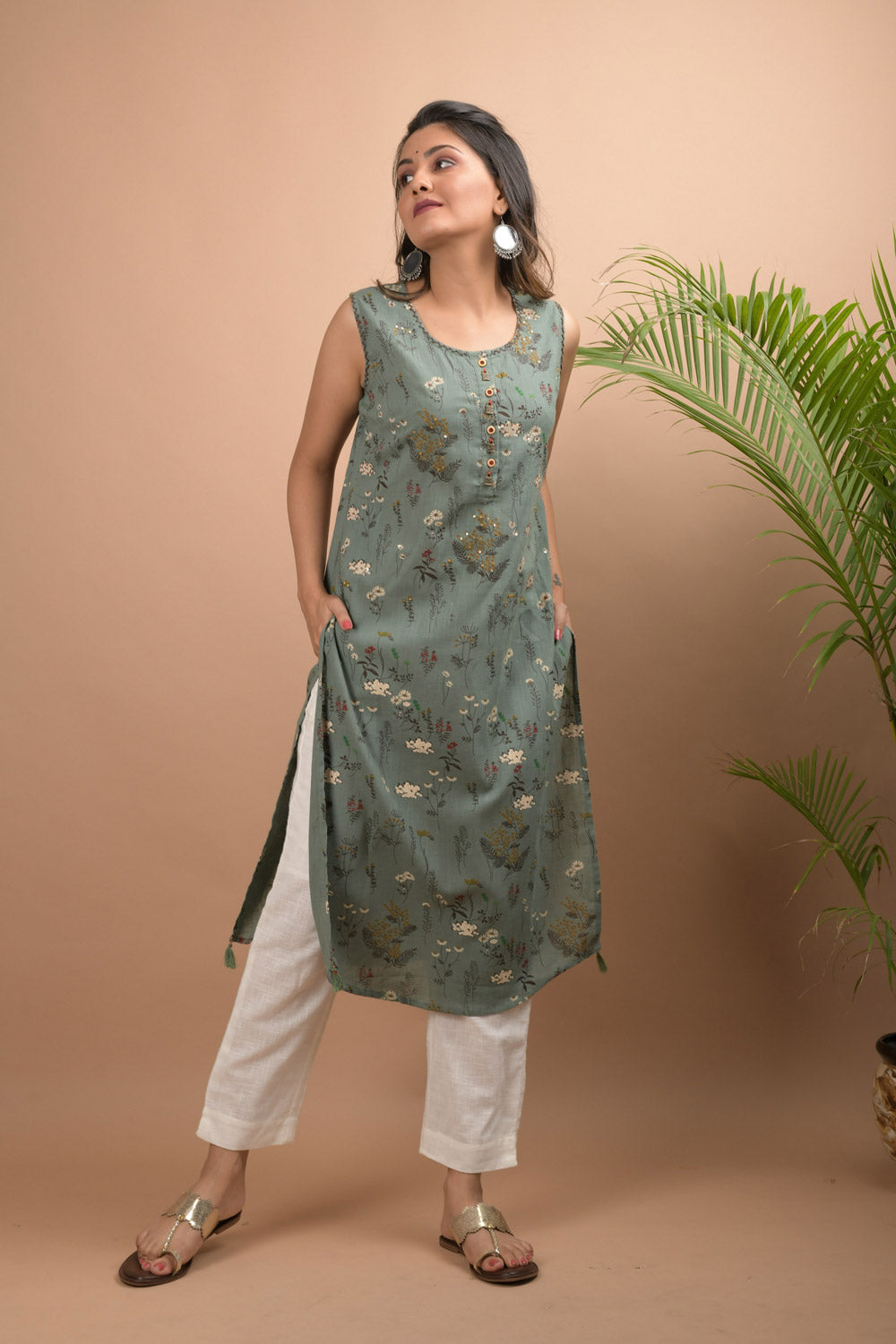 Kaajh Women's Green Sleeveless Printed Kurta Pant Set