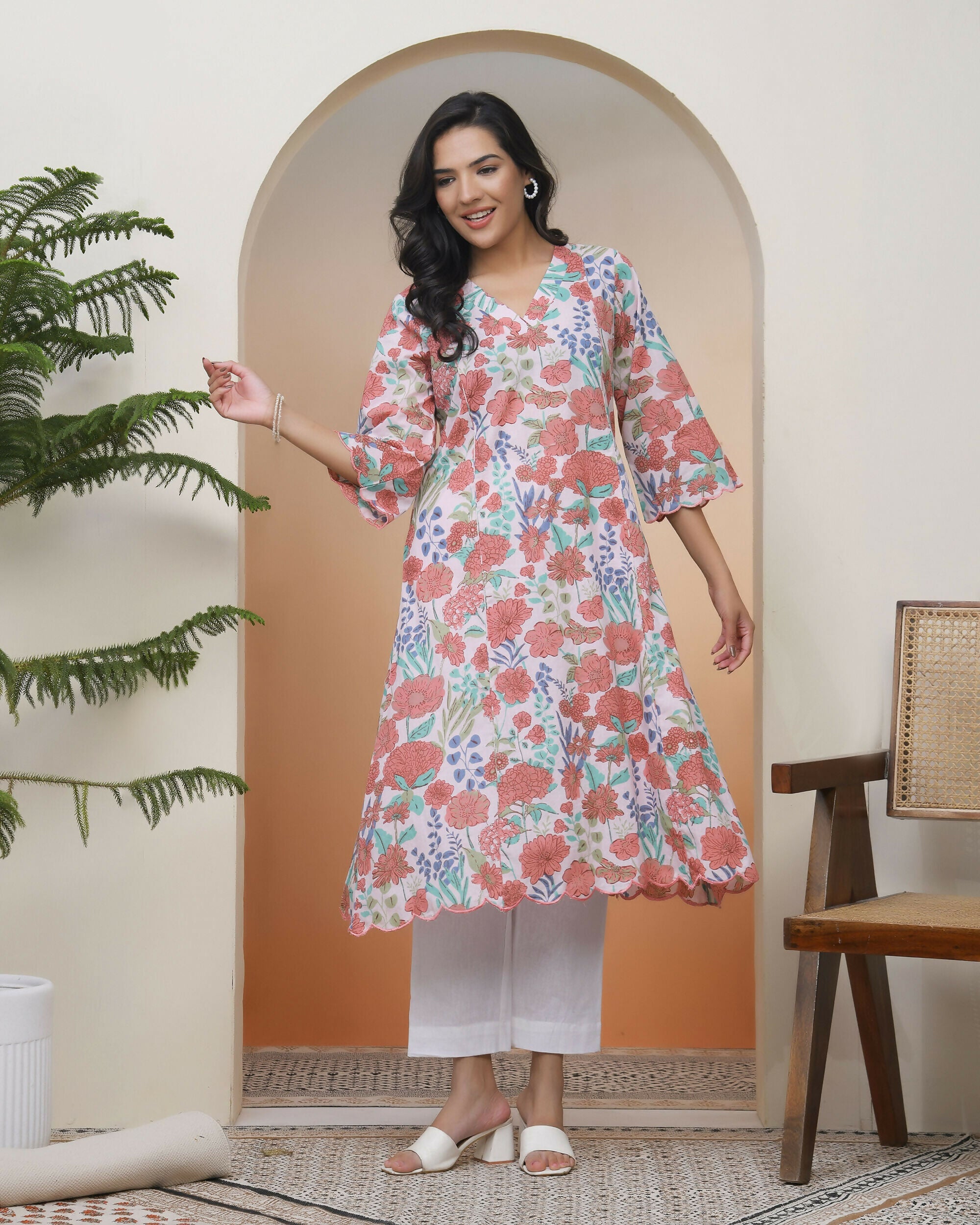 Vaasva Women Peach Floral Cotton Printed Flare Kurti With Pant