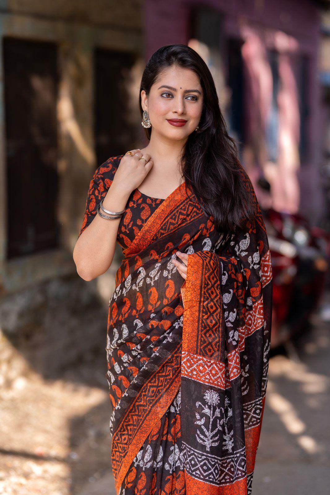 Orange Linen Blend Ethnic Motifs Saree with Unstitched Blouse - Hiral Fashion