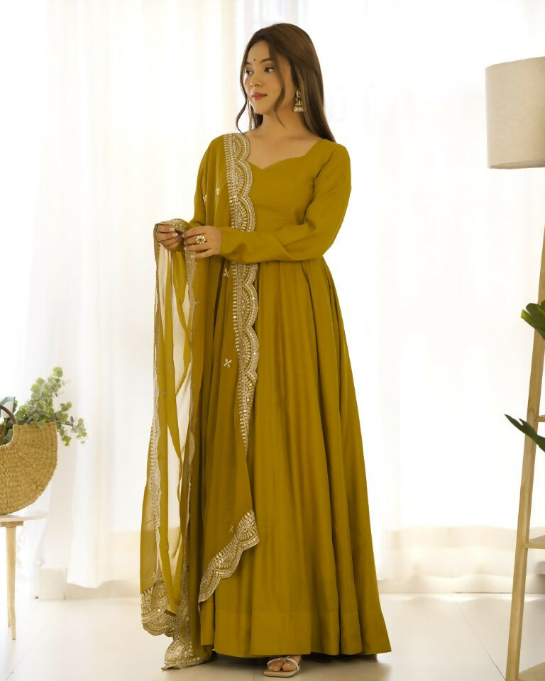 Teeya Creation Mustard Color Pure Roman Silk Chanderi Party Wear Fully Stitched Gown