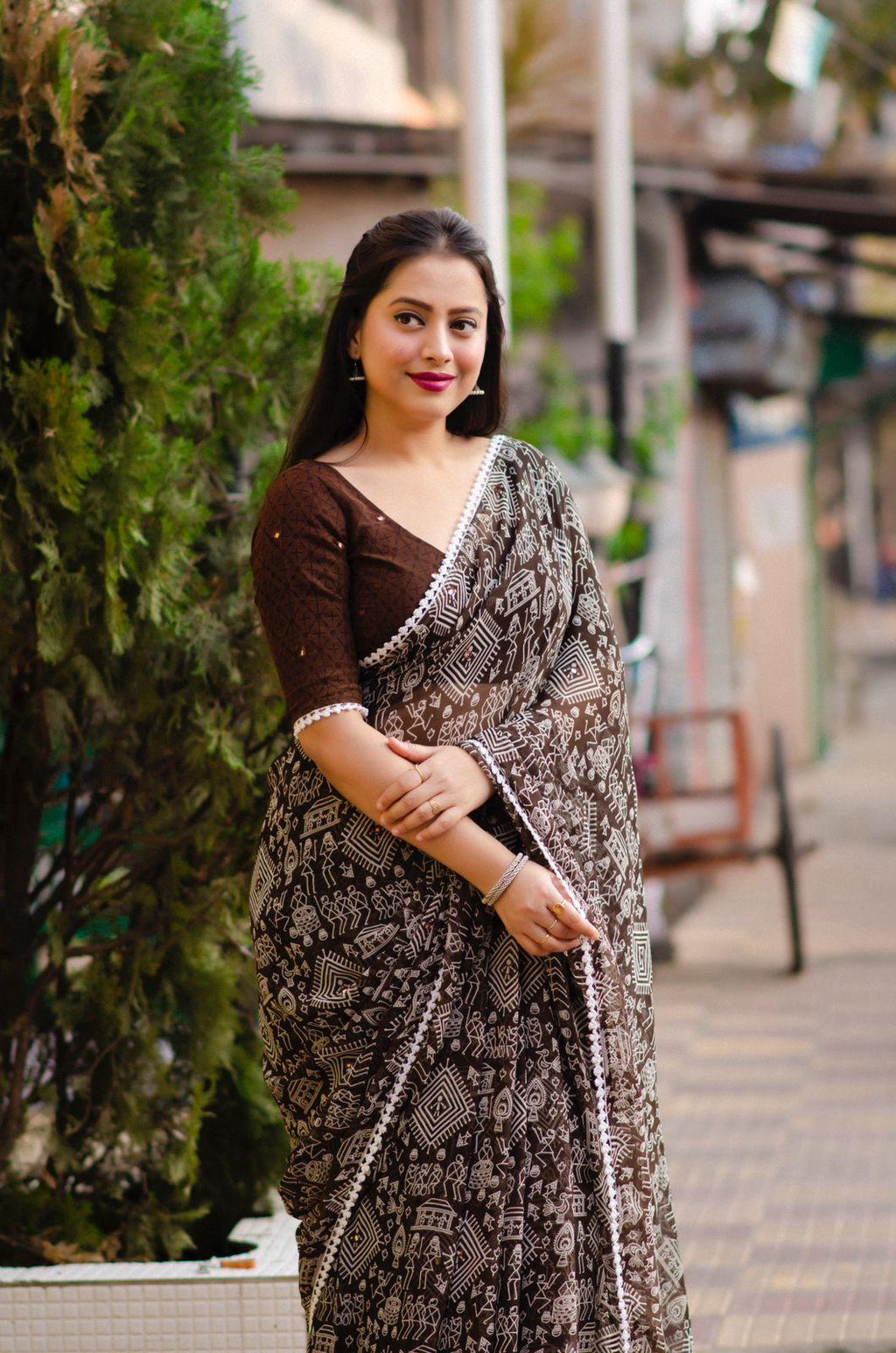 Coffee Poly Georgette Ethnic Motifs Saree with Unstitched Blouse - Hiral Fashion