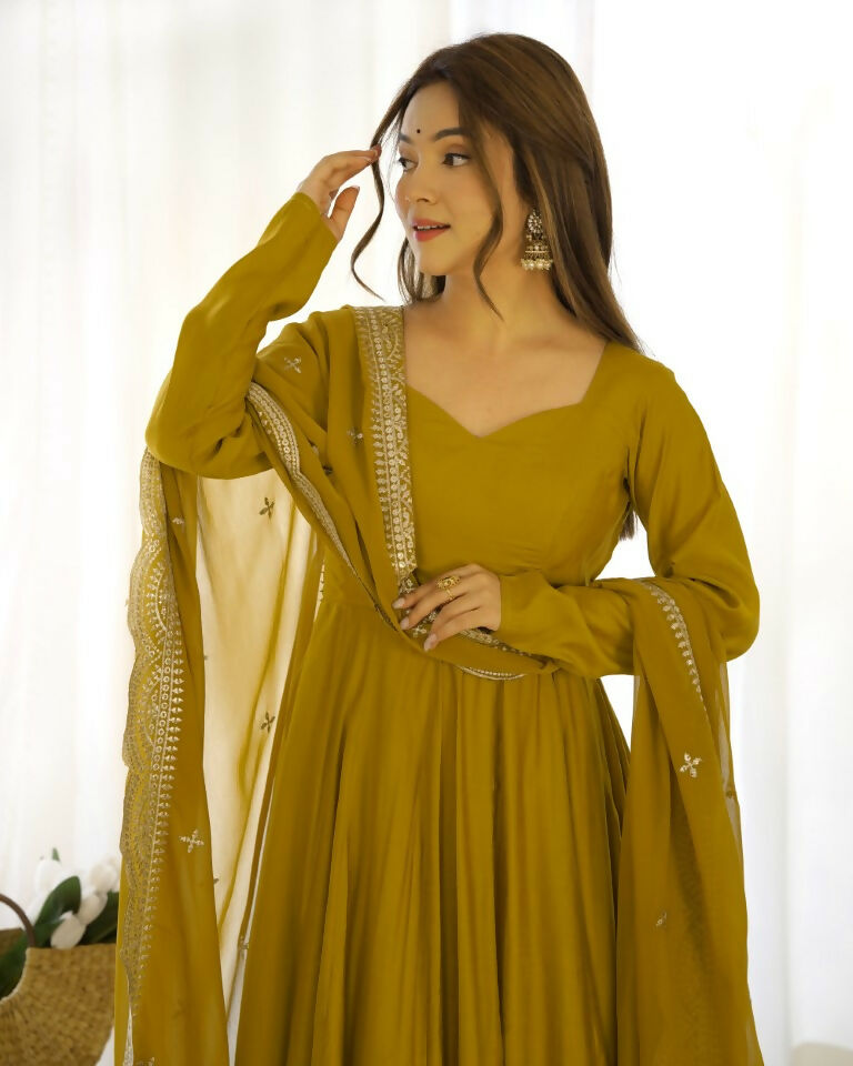 Teeya Creation Mustard Color Pure Roman Silk Chanderi Party Wear Fully Stitched Gown