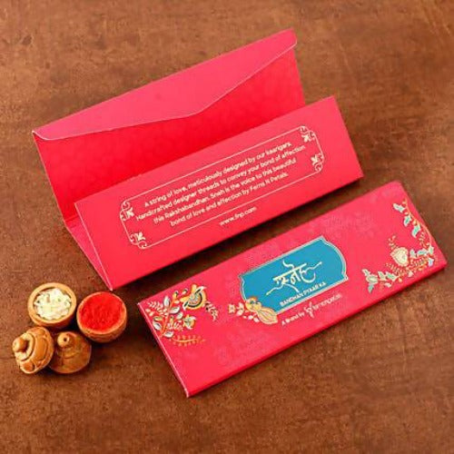 Ganesha Design Rakhi and Cashew Jar