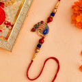 trueBrowns X Voylla Colorful Peacock Motif Thread Rakhi