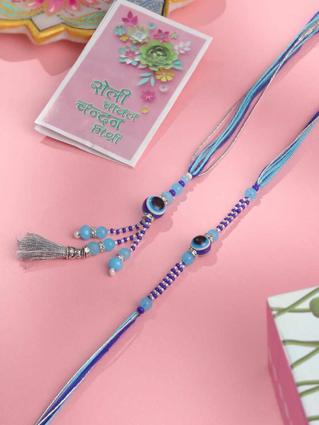NVR Set of 2 Blue Evil Eye Artificial Beads Bhaiya Bhabhi Rakhi with Roli Chawal Chandan & Mishri