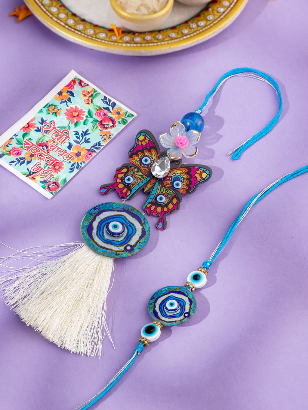 NVR Blue Evil Eye Artificial Beads Set of 2 Bhaiya Bhabhi Rakhi with Roli Chawal Chandan & Mishri